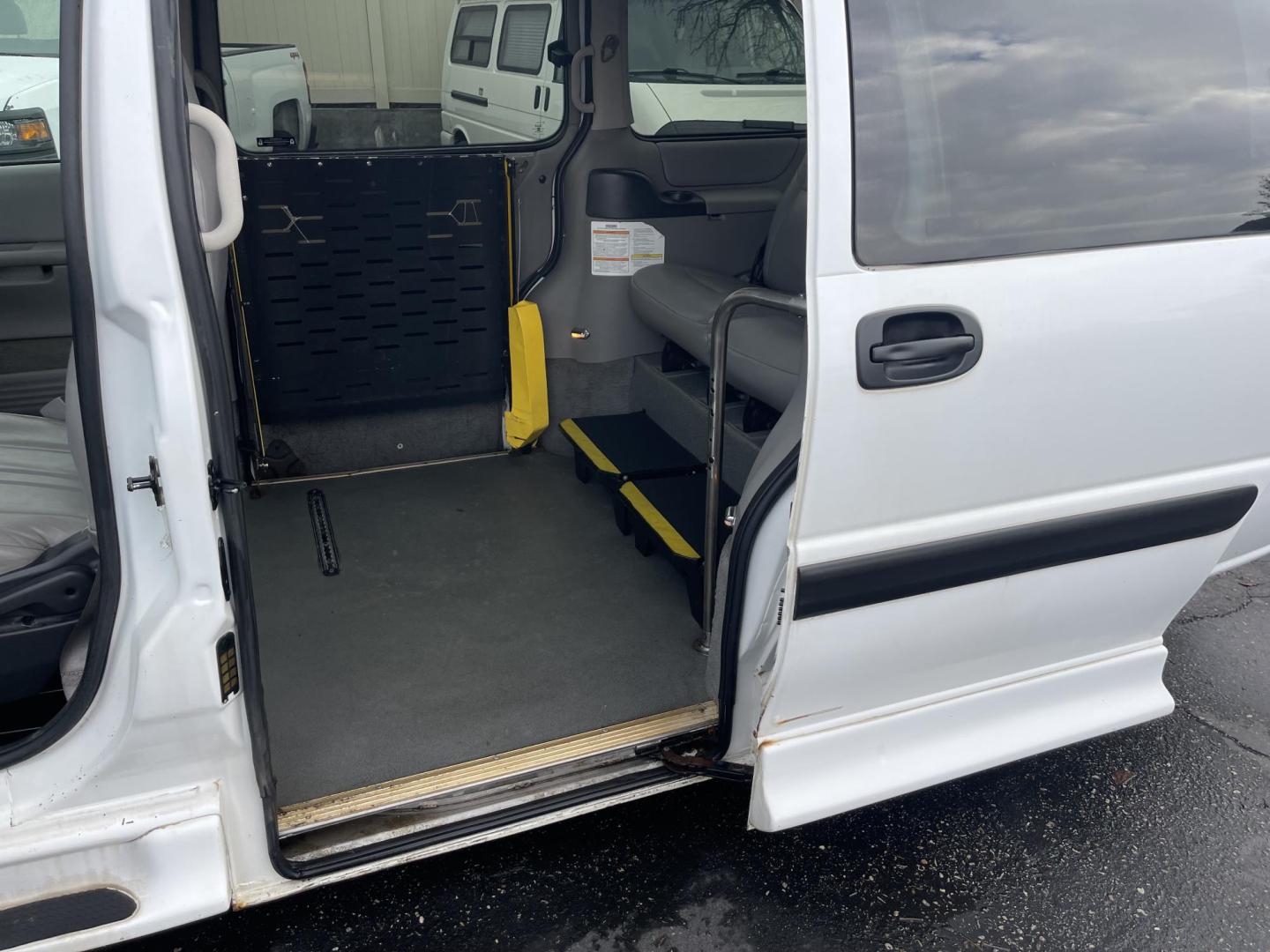 2002 White /Grey Chevrolet Venture Extended Wheelbase LS Wheel Chair Van (1GNDX03E82D) with an 3.4L V6 OHV 12V engine, 4-Speed Automatic Overdrive transmission, located at 813 E Fairview Ave, Meridian , ID, 83642, (208) 336-8230, 43.618851, -116.384010 - This van is a handicap wheelchair van. It has an Eldorado conversion. The van runs and drives good is clean and ready to go. If you are in need of an inexpensive wheelchair van this is a great option. - Photo#12