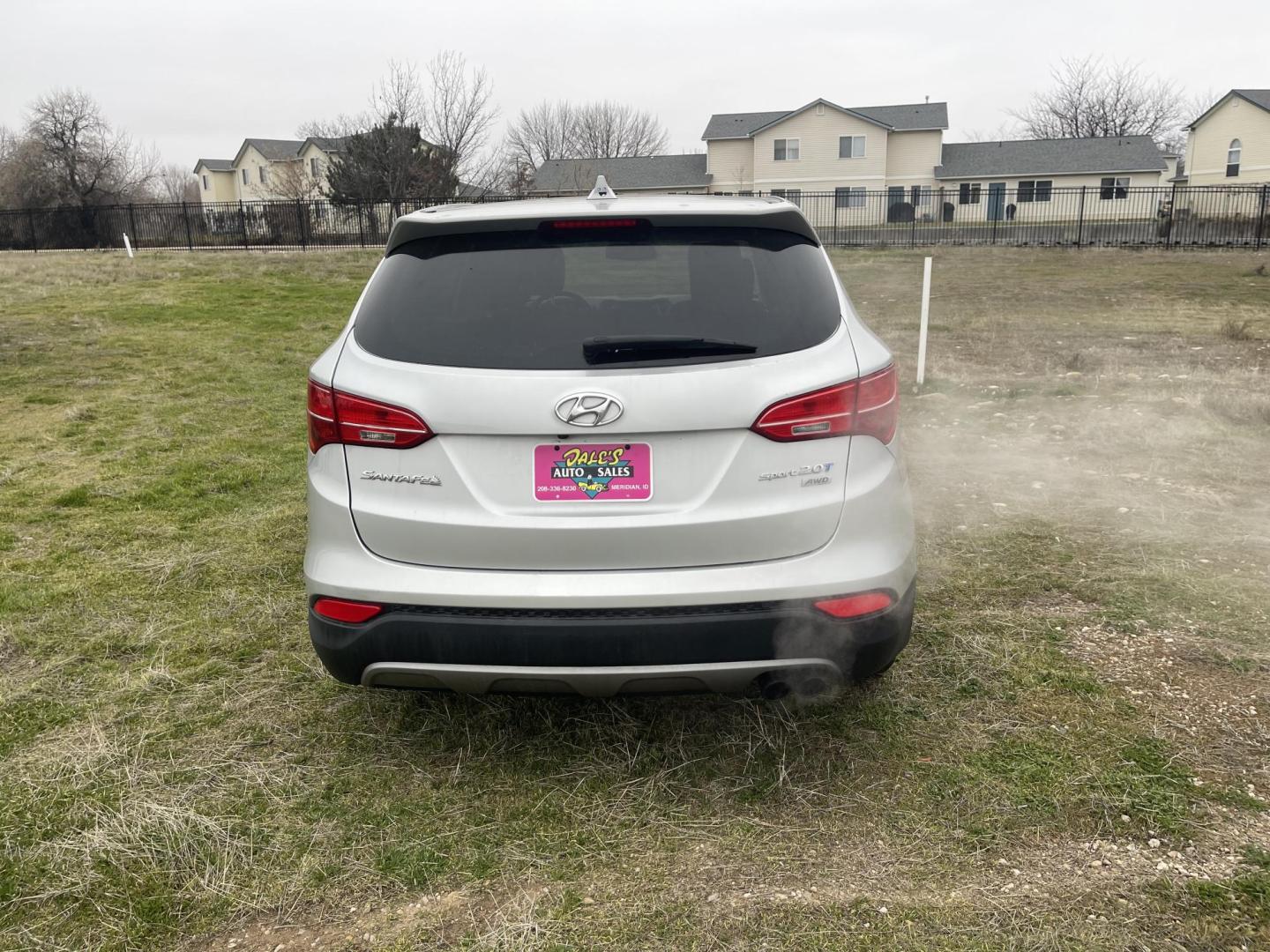 2013 Silver /Black Hyundai Santa Fe Sport 2.0 AWD (5XYZWDLA6DG) with an 2.0L L4 DOHC 16V engine, 6-Speed Automatic transmission, located at 813 E Fairview Ave, Meridian , ID, 83642, (208) 336-8230, 43.618851, -116.384010 - 2013 Hyundai Sante Fe Sport AWD. If you need a really good AWD vehicle for super cheap this is an excellent option. Take a look. This SUV has leather, Sunroof, NAV, and heated seats. A fantastic value. Come take a test drive. - Photo#4