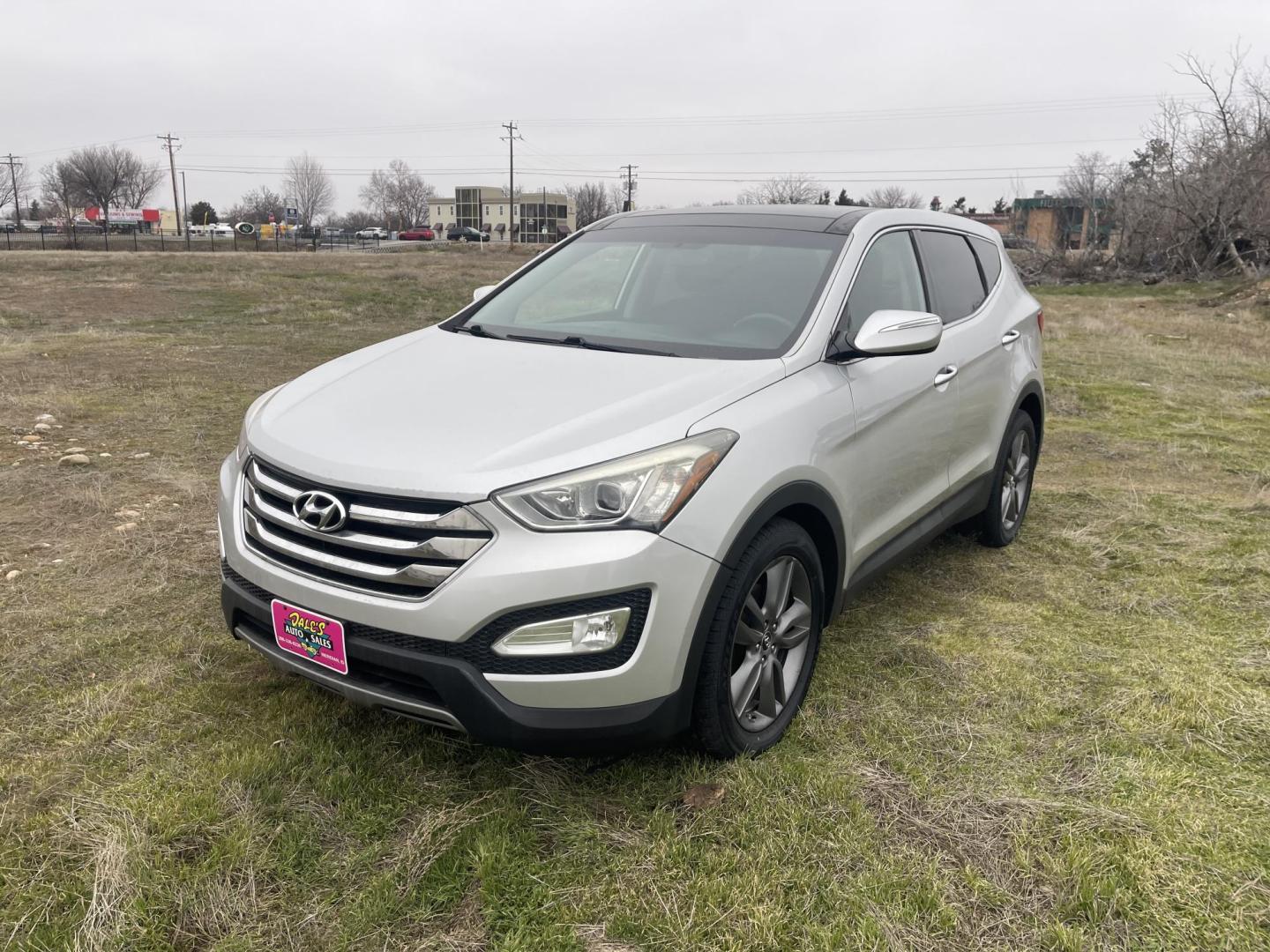 2013 Silver /Black Hyundai Santa Fe Sport 2.0 AWD (5XYZWDLA6DG) with an 2.0L L4 DOHC 16V engine, 6-Speed Automatic transmission, located at 813 E Fairview Ave, Meridian , ID, 83642, (208) 336-8230, 43.618851, -116.384010 - 2013 Hyundai Sante Fe Sport AWD. If you need a really good AWD vehicle for super cheap this is an excellent option. Take a look. This SUV has leather, Sunroof, NAV, and heated seats. A fantastic value. Come take a test drive. - Photo#1