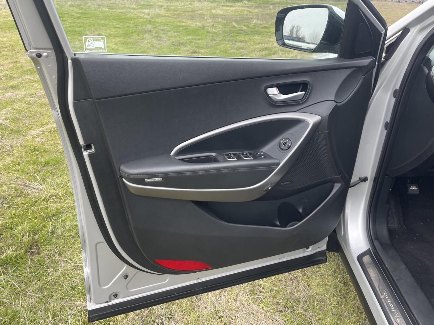 2013 Silver /Black Hyundai Santa Fe Sport 2.0 AWD (5XYZWDLA6DG) with an 2.0L L4 DOHC 16V engine, 6-Speed Automatic transmission, located at 813 E Fairview Ave, Meridian , ID, 83642, (208) 336-8230, 43.618851, -116.384010 - 2013 Hyundai Sante Fe Sport AWD. If you need a really good AWD vehicle for super cheap this is an excellent option. Take a look. This SUV has leather, Sunroof, NAV, and heated seats. A fantastic value. Come take a test drive. - Photo#5