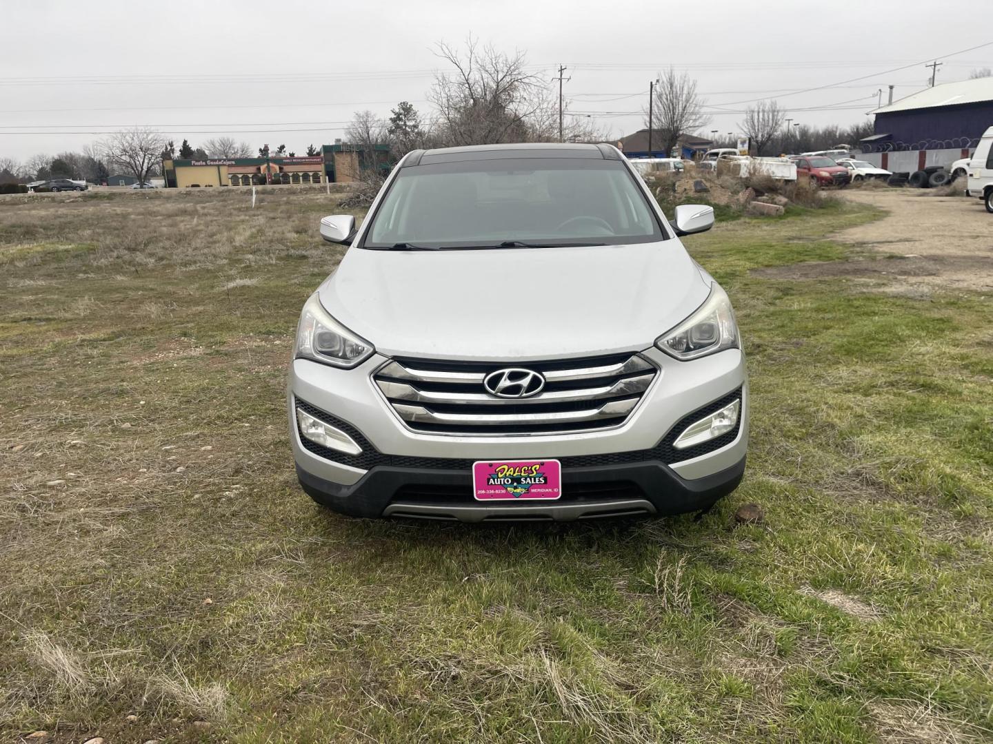 2013 Silver /Black Hyundai Santa Fe Sport 2.0 AWD (5XYZWDLA6DG) with an 2.0L L4 DOHC 16V engine, 6-Speed Automatic transmission, located at 813 E Fairview Ave, Meridian , ID, 83642, (208) 336-8230, 43.618851, -116.384010 - 2013 Hyundai Sante Fe Sport AWD. If you need a really good AWD vehicle for super cheap this is an excellent option. Take a look. This SUV has leather, Sunroof, NAV, and heated seats. A fantastic value. Come take a test drive. - Photo#2