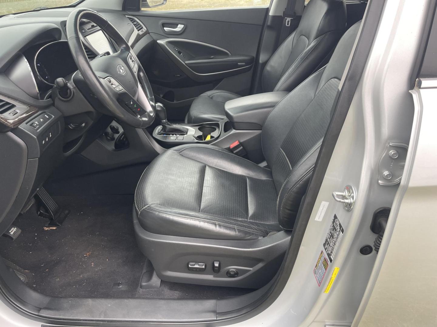 2013 Silver /Black Hyundai Santa Fe Sport 2.0 AWD (5XYZWDLA6DG) with an 2.0L L4 DOHC 16V engine, 6-Speed Automatic transmission, located at 813 E Fairview Ave, Meridian , ID, 83642, (208) 336-8230, 43.618851, -116.384010 - 2013 Hyundai Sante Fe Sport AWD. If you need a really good AWD vehicle for super cheap this is an excellent option. Take a look. This SUV has leather, Sunroof, NAV, and heated seats. A fantastic value. Come take a test drive. - Photo#6