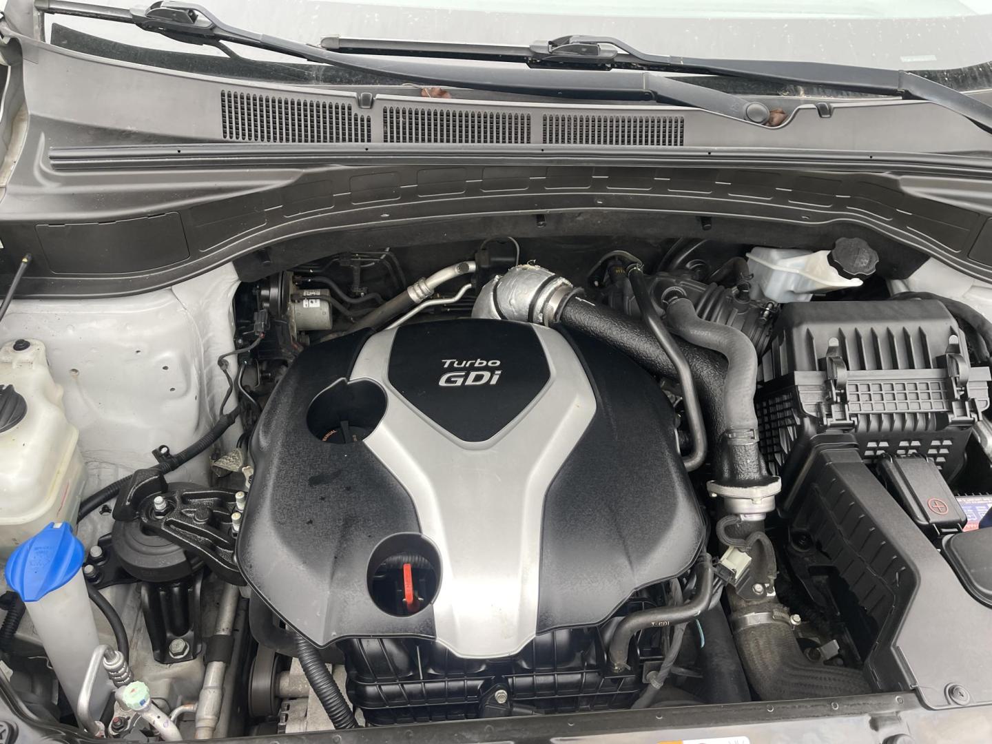 2013 Silver /Black Hyundai Santa Fe Sport 2.0 AWD (5XYZWDLA6DG) with an 2.0L L4 DOHC 16V engine, 6-Speed Automatic transmission, located at 813 E Fairview Ave, Meridian , ID, 83642, (208) 336-8230, 43.618851, -116.384010 - 2013 Hyundai Sante Fe Sport AWD. If you need a really good AWD vehicle for super cheap this is an excellent option. Take a look. This SUV has leather, Sunroof, NAV, and heated seats. A fantastic value. Come take a test drive. - Photo#15