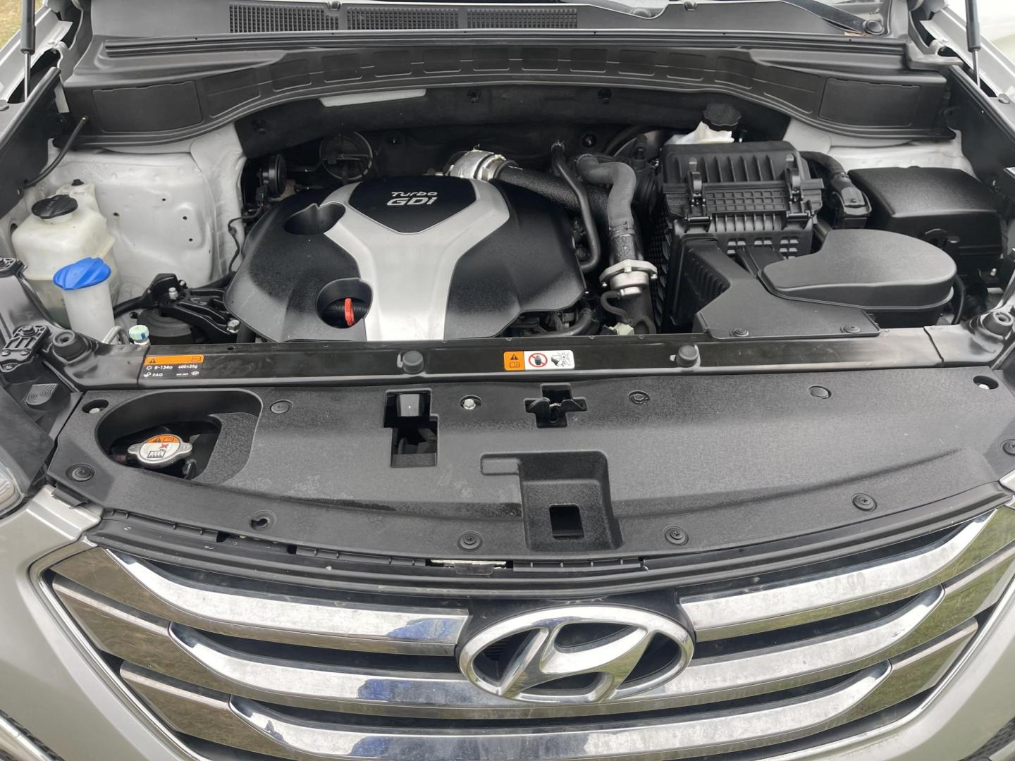 2013 Silver /Black Hyundai Santa Fe Sport 2.0 AWD (5XYZWDLA6DG) with an 2.0L L4 DOHC 16V engine, 6-Speed Automatic transmission, located at 813 E Fairview Ave, Meridian , ID, 83642, (208) 336-8230, 43.618851, -116.384010 - 2013 Hyundai Sante Fe Sport AWD. If you need a really good AWD vehicle for super cheap this is an excellent option. Take a look. This SUV has leather, Sunroof, NAV, and heated seats. A fantastic value. Come take a test drive. - Photo#16