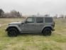 2022 Grey /Black Jeep Wrangler Unlimited Sahara 4XE (1C4JJXP62NW) with an 2.0L L4 DOHC 16V HYBRID engine, AT transmission, located at 813 E Fairview Ave, Meridian , ID, 83642, (208) 336-8230, 43.618851, -116.384010 - What a nice Jeep, Very clean, and highly optioned. If you want a nice Wrangler come take a look. This will give you great service for a long long time and when you plug this in and use the hybrid this vehicle gets you around with no gas, its the best of both worlds. This Wrangler has leather, exce - Photo#0