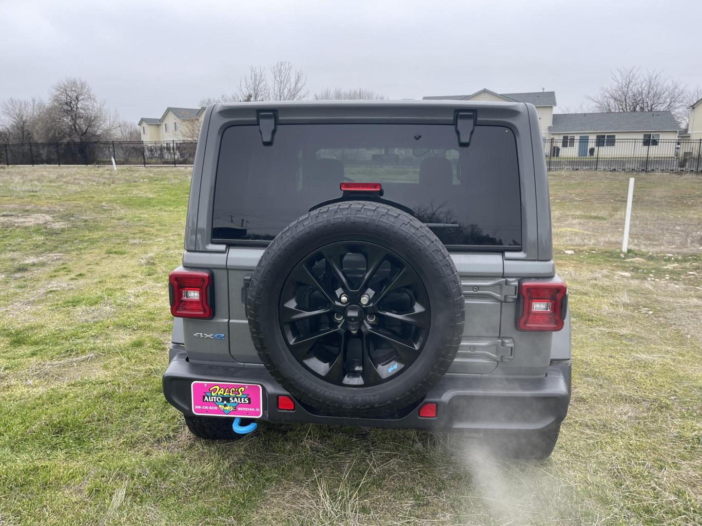 2022 Grey /Black Jeep Wrangler Unlimited Sahara 4XE (1C4JJXP62NW) with an 2.0L L4 DOHC 16V HYBRID engine, AT transmission, located at 813 E Fairview Ave, Meridian , ID, 83642, (208) 336-8230, 43.618851, -116.384010 - What a nice Jeep, Very clean, and highly optioned. If you want a nice Wrangler come take a look. This will give you great service for a long long time and when you plug this in and use the hybrid this vehicle gets you around with no gas, its the best of both worlds. This Wrangler has leather, exce - Photo#4