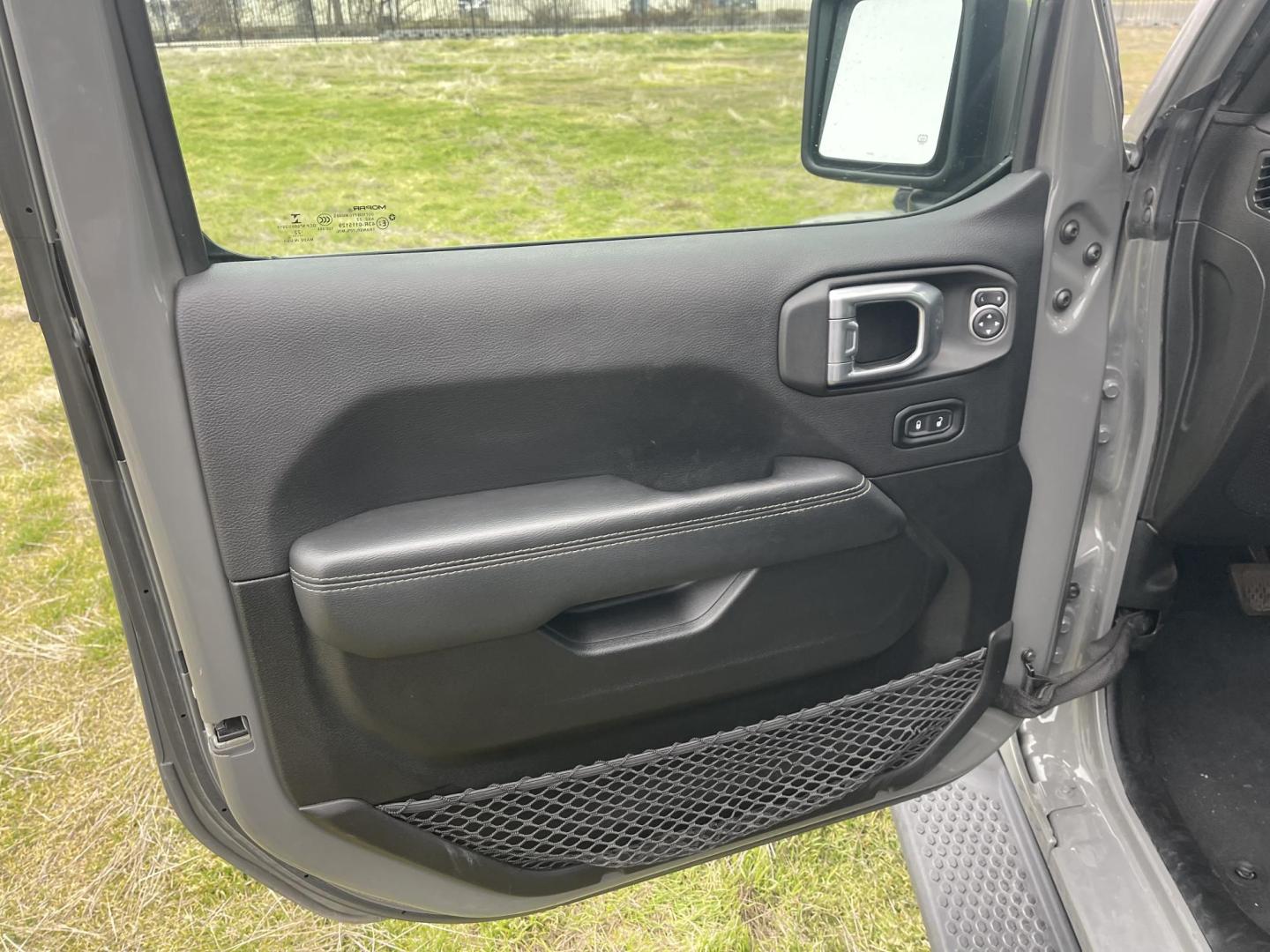 2022 Grey /Black Jeep Wrangler Unlimited Sahara 4XE (1C4JJXP62NW) with an 2.0L L4 DOHC 16V HYBRID engine, AT transmission, located at 813 E Fairview Ave, Meridian , ID, 83642, (208) 336-8230, 43.618851, -116.384010 - What a nice Jeep, Very clean, and highly optioned. If you want a nice Wrangler come take a look. This will give you great service for a long long time and when you plug this in and use the hybrid this vehicle gets you around with no gas, its the best of both worlds. This Wrangler has leather, exce - Photo#5
