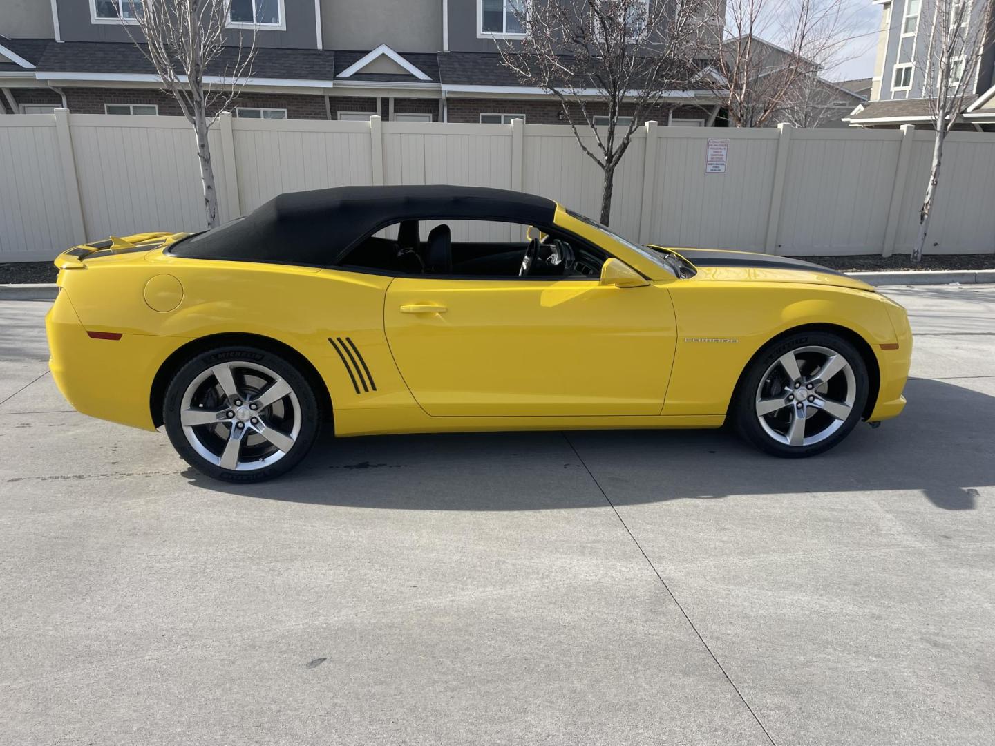 2012 Yellow /Black Chevrolet Camaro Convertible 2SS (2G1FK3DJ2C9) with an 6.2L V8 OHV 16V engine, 6-Speed Automatic transmission, located at 813 E Fairview Ave, Meridian , ID, 83642, (208) 336-8230, 43.618851, -116.384010 - A one owner Boise car. 2012 Camaro Convertible SS. Yellow with black SS stripe and black leather with all the factory options. Heads up display, Boston Premium Audio, Leather, SS consul gages, Magnuson Supercharger, long tube headers, it has catalytic converters and Brand new Michellin tires. A su - Photo#5