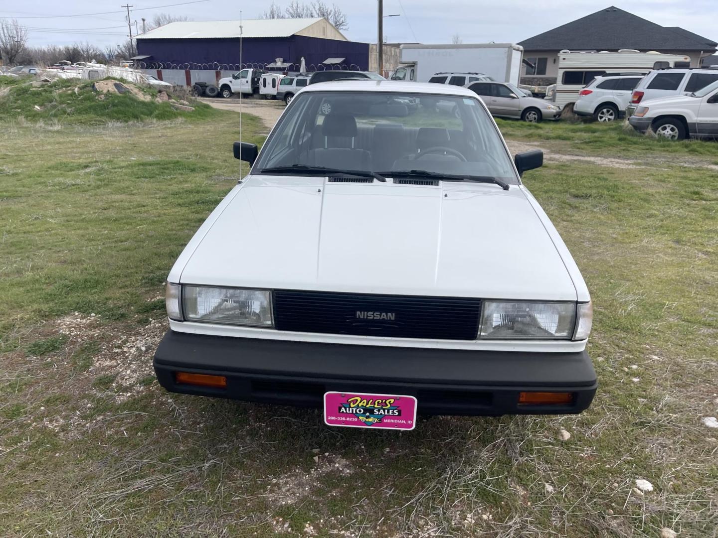 1989 White /Brown Nissan Sentra XE (JN1GB22S0KU) with an 1.6L L4 SOHC 12V engine, 5-Speed Manual Overdrive transmission, located at 813 E Fairview Ave, Meridian , ID, 83642, (208) 336-8230, 43.618851, -116.384010 - A one owner, super clean, always stored indoors, no cracks in the dash even, towels were on the seats when I got it, very very very nice unique older but spectacular vehicle. It has a 5spd with A/C that works perfectly, brand new Michellin tires. If you need a great little car for cheap this is yo - Photo#2