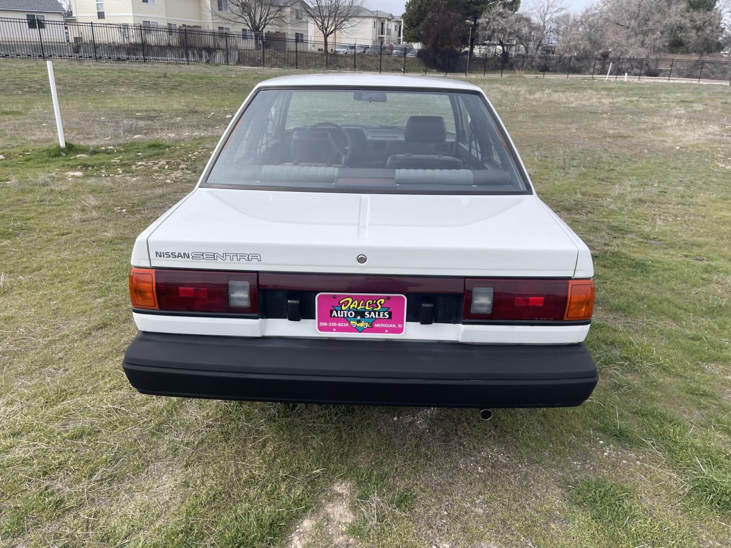 1989 White /Brown Nissan Sentra XE (JN1GB22S0KU) with an 1.6L L4 SOHC 12V engine, 5-Speed Manual Overdrive transmission, located at 813 E Fairview Ave, Meridian , ID, 83642, (208) 336-8230, 43.618851, -116.384010 - A one owner, super clean, always stored indoors, no cracks in the dash even, towels were on the seats when I got it, very very very nice unique older but spectacular vehicle. It has a 5spd with A/C that works perfectly, brand new Michellin tires. If you need a great little car for cheap this is yo - Photo#4