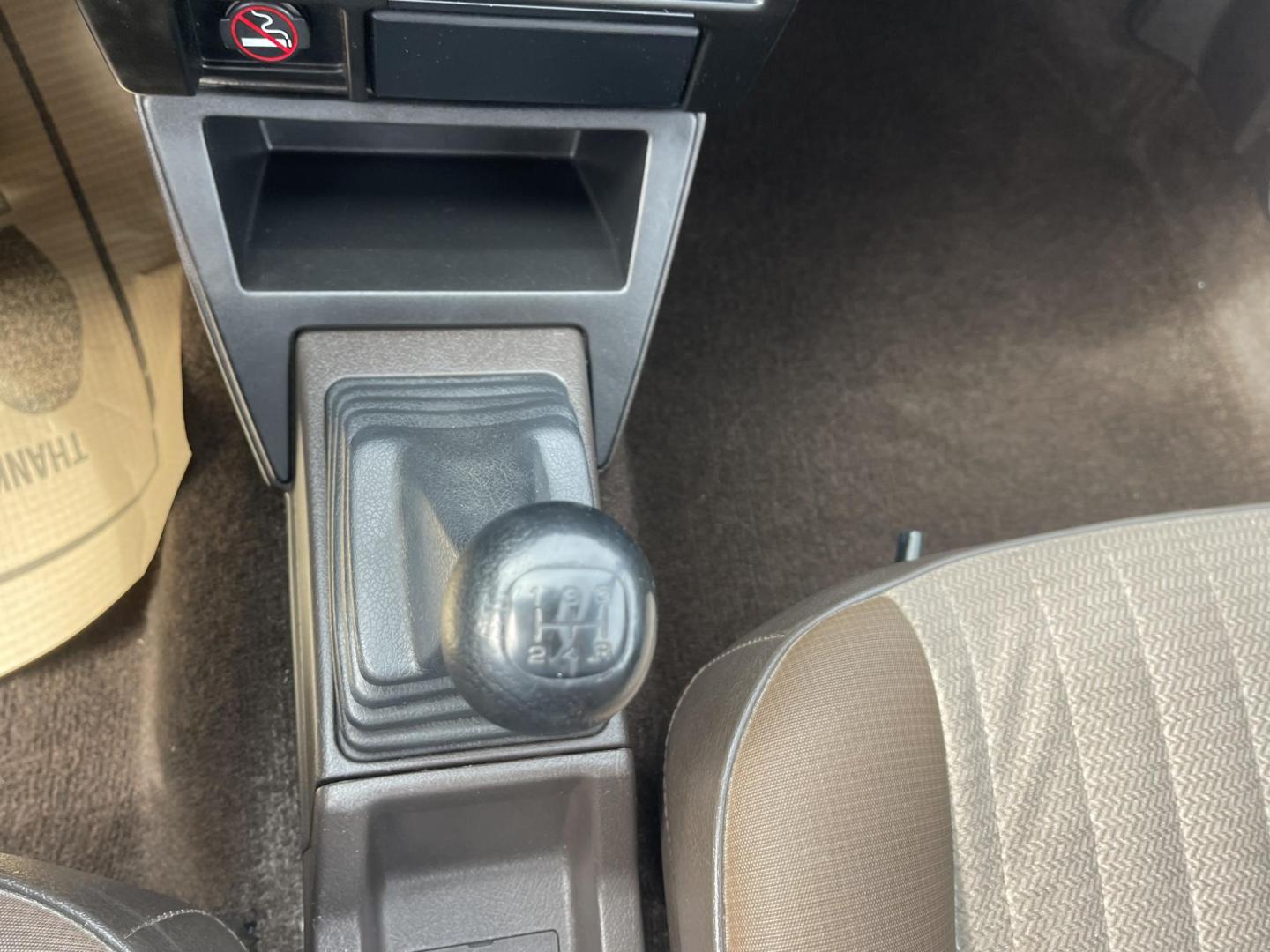 1989 White /Brown Nissan Sentra XE (JN1GB22S0KU) with an 1.6L L4 SOHC 12V engine, 5-Speed Manual Overdrive transmission, located at 813 E Fairview Ave, Meridian , ID, 83642, (208) 336-8230, 43.618851, -116.384010 - A one owner, super clean, always stored indoors, no cracks in the dash even, towels were on the seats when I got it, very very very nice unique older but spectacular vehicle. It has a 5spd with A/C that works perfectly, brand new Michellin tires. If you need a great little car for cheap this is yo - Photo#12