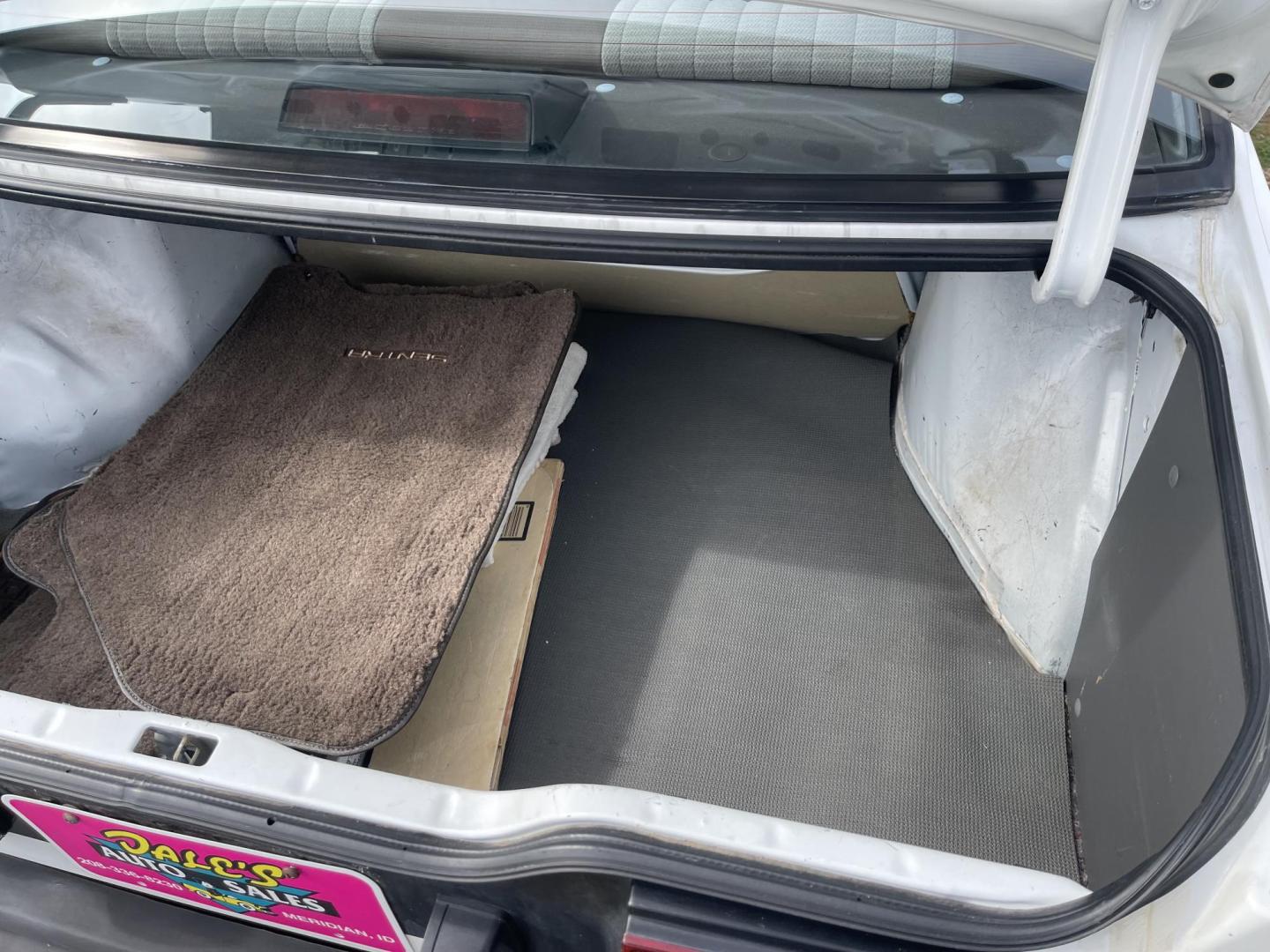 1989 White /Brown Nissan Sentra XE (JN1GB22S0KU) with an 1.6L L4 SOHC 12V engine, 5-Speed Manual Overdrive transmission, located at 813 E Fairview Ave, Meridian , ID, 83642, (208) 336-8230, 43.618851, -116.384010 - A one owner, super clean, always stored indoors, no cracks in the dash even, towels were on the seats when I got it, very very very nice unique older but spectacular vehicle. It has a 5spd with A/C that works perfectly, brand new Michellin tires. If you need a great little car for cheap this is yo - Photo#16