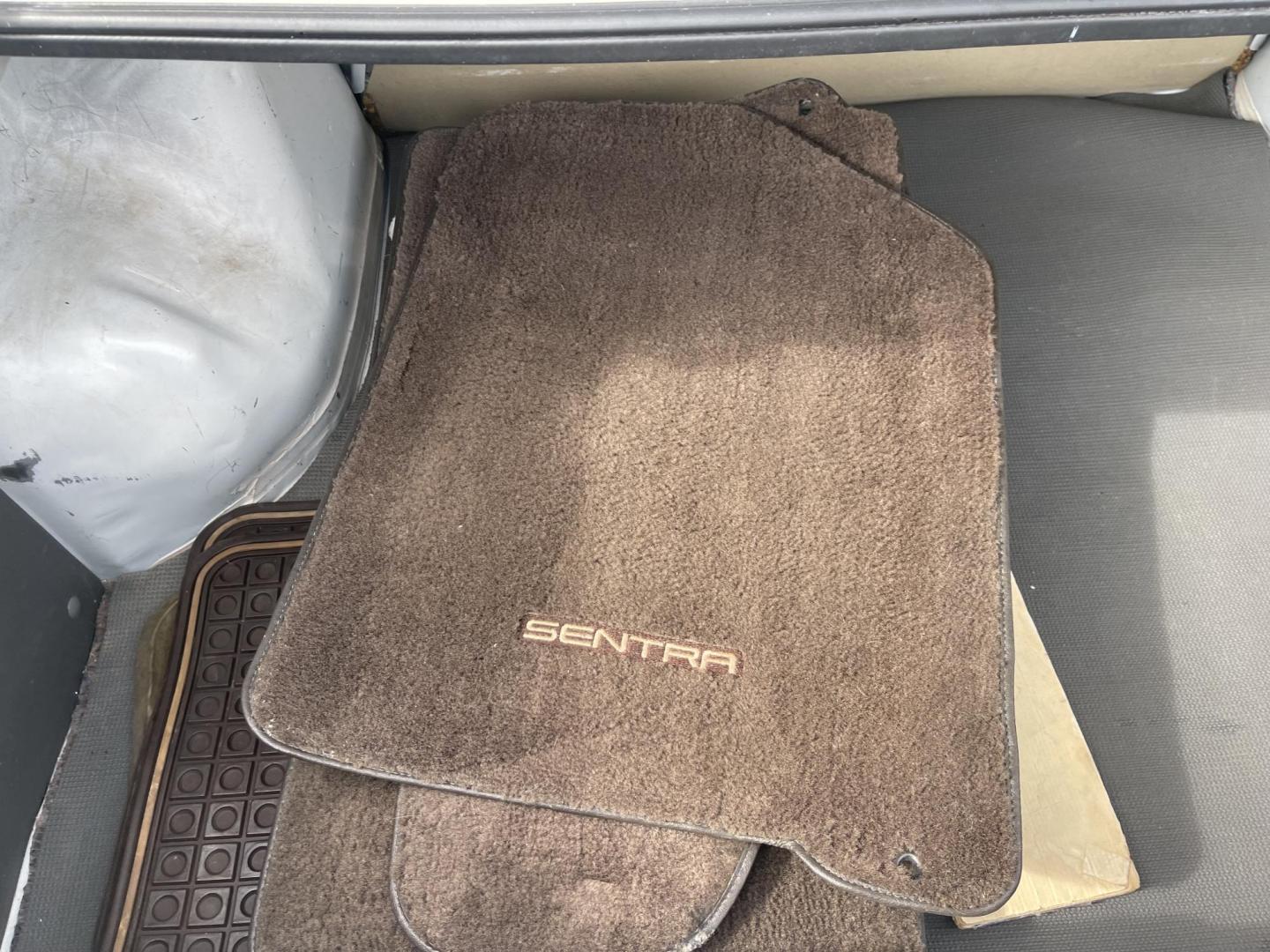 1989 White /Brown Nissan Sentra XE (JN1GB22S0KU) with an 1.6L L4 SOHC 12V engine, 5-Speed Manual Overdrive transmission, located at 813 E Fairview Ave, Meridian , ID, 83642, (208) 336-8230, 43.618851, -116.384010 - A one owner, super clean, always stored indoors, no cracks in the dash even, towels were on the seats when I got it, very very very nice unique older but spectacular vehicle. It has a 5spd with A/C that works perfectly, brand new Michellin tires. If you need a great little car for cheap this is yo - Photo#17