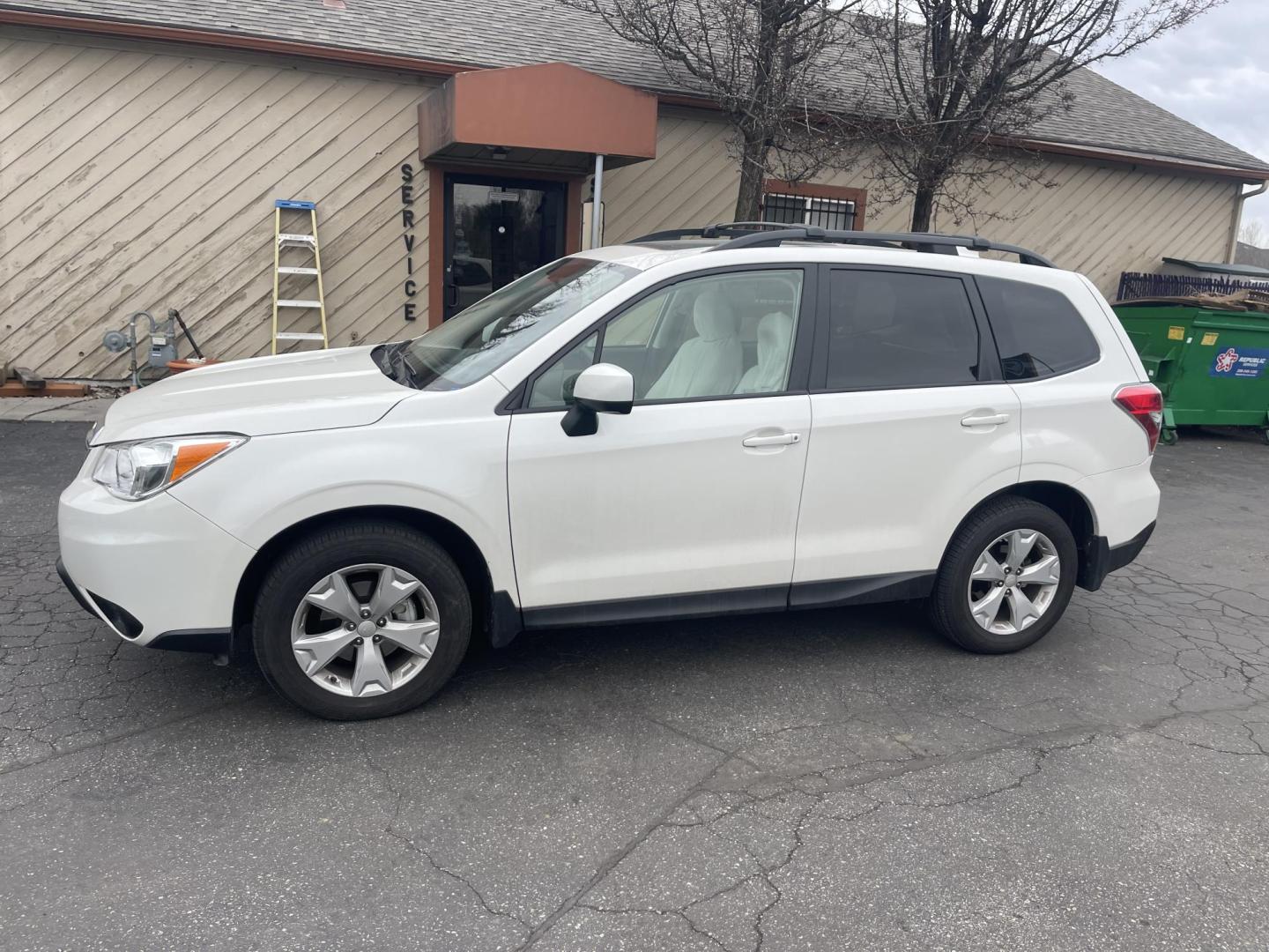 2016 White / Grey Subaru Forester 2.5i Premium PZEV CVT (JF2SJADC0GH) with an 2.5L H4 SOHC 16V engine, CVT transmission, located at 813 E Fairview Ave, Meridian , ID, 83642, (208) 336-8230, 43.618851, -116.384010 - One owner, bought in Boise, Premium with eyesight and NAV, sunroof and brand new tires, only 17k Miles. This car had towels on the seats from the day they bought it, look at the pics!!! Crazy crazy clean like brand new. Come and take a look. - Photo#0