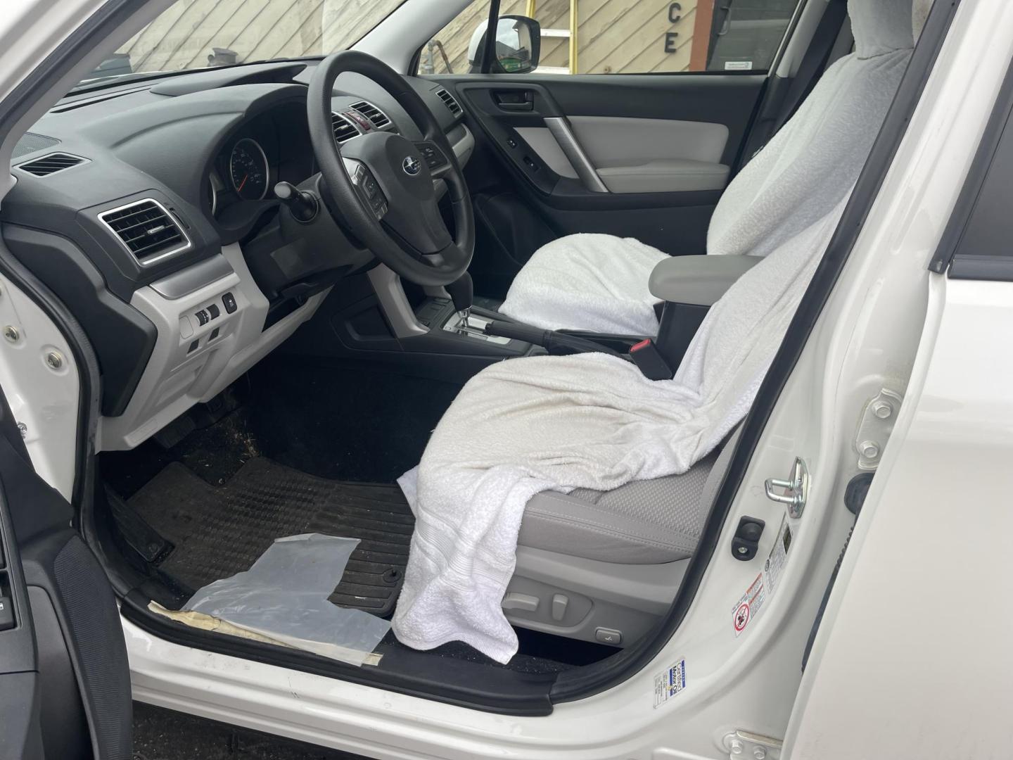 2016 White / Grey Subaru Forester 2.5i Premium PZEV CVT (JF2SJADC0GH) with an 2.5L H4 SOHC 16V engine, CVT transmission, located at 813 E Fairview Ave, Meridian , ID, 83642, (208) 336-8230, 43.618851, -116.384010 - One owner, bought in Boise, Premium with eyesight and NAV, sunroof and brand new tires, only 17k Miles. This car had towels on the seats from the day they bought it, look at the pics!!! Crazy crazy clean like brand new. Come and take a look. - Photo#5