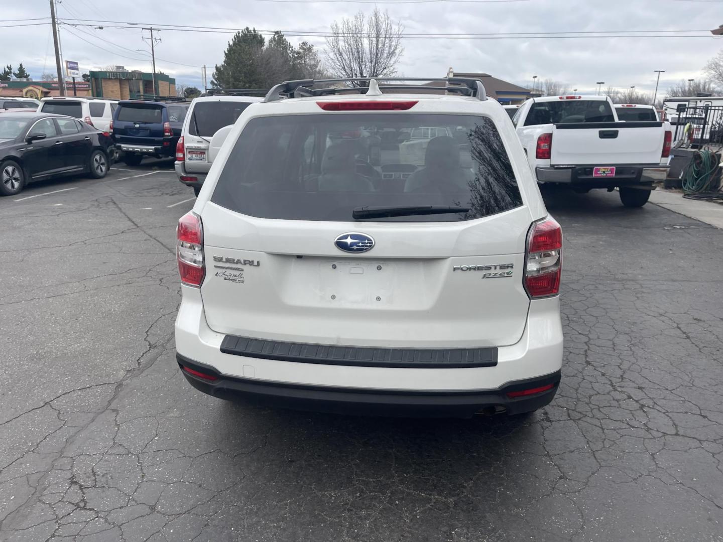 2016 White / Grey Subaru Forester 2.5i Premium PZEV CVT (JF2SJADC0GH) with an 2.5L H4 SOHC 16V engine, CVT transmission, located at 813 E Fairview Ave, Meridian , ID, 83642, (208) 336-8230, 43.618851, -116.384010 - One owner, bought in Boise, Premium with eyesight and NAV, sunroof and brand new tires, only 17k Miles. This car had towels on the seats from the day they bought it, look at the pics!!! Crazy crazy clean like brand new. Come and take a look. - Photo#3