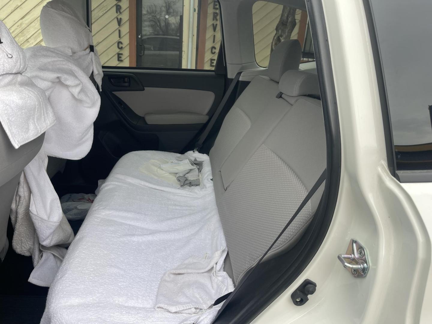 2016 White / Grey Subaru Forester 2.5i Premium PZEV CVT (JF2SJADC0GH) with an 2.5L H4 SOHC 16V engine, CVT transmission, located at 813 E Fairview Ave, Meridian , ID, 83642, (208) 336-8230, 43.618851, -116.384010 - One owner, bought in Boise, Premium with eyesight and NAV, sunroof and brand new tires, only 17k Miles. This car had towels on the seats from the day they bought it, look at the pics!!! Crazy crazy clean like brand new. Come and take a look. - Photo#8