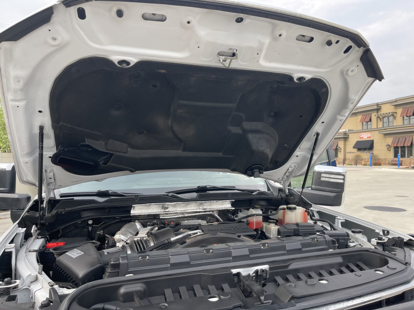 2020 White /Black GMC Sierra 2500HD SLT Crew Cab 4WD (1GT49NEY7LF) with an 6.6L V8 OHV 16 DIESEL engine, 10A transmission, located at 813 E Fairview Ave, Meridian , ID, 83642, (208) 336-8230, 43.618851, -116.384010 - 2020 GMC Sierra 2500HD Crew Cab SLT Short Box 4x4 Duramax. What a nice truck one owner loaded up front camera, leather, adaptive cruise, brand new Michellin tires, Rolling bed cover, sunroof, aftermarket grille protector. If you want a super nice trailer puller this is the one to have.- Photo#24