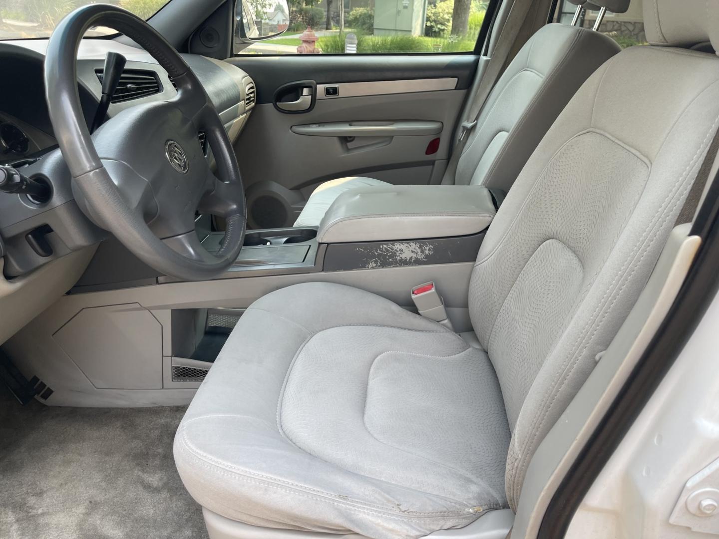 2005 White / Grey Buick Rendezvous CX (3G5DA03E65S) with an 3.4L V6 OHV 12V engine, 4A OD transmission, located at 813 E Fairview Ave, Meridian , ID, 83642, (208) 336-8230, 43.618851, -116.384010 - Runs and drives very well, A/C works perfect. If you need a cheap get around car this is a great choice.- Photo#5