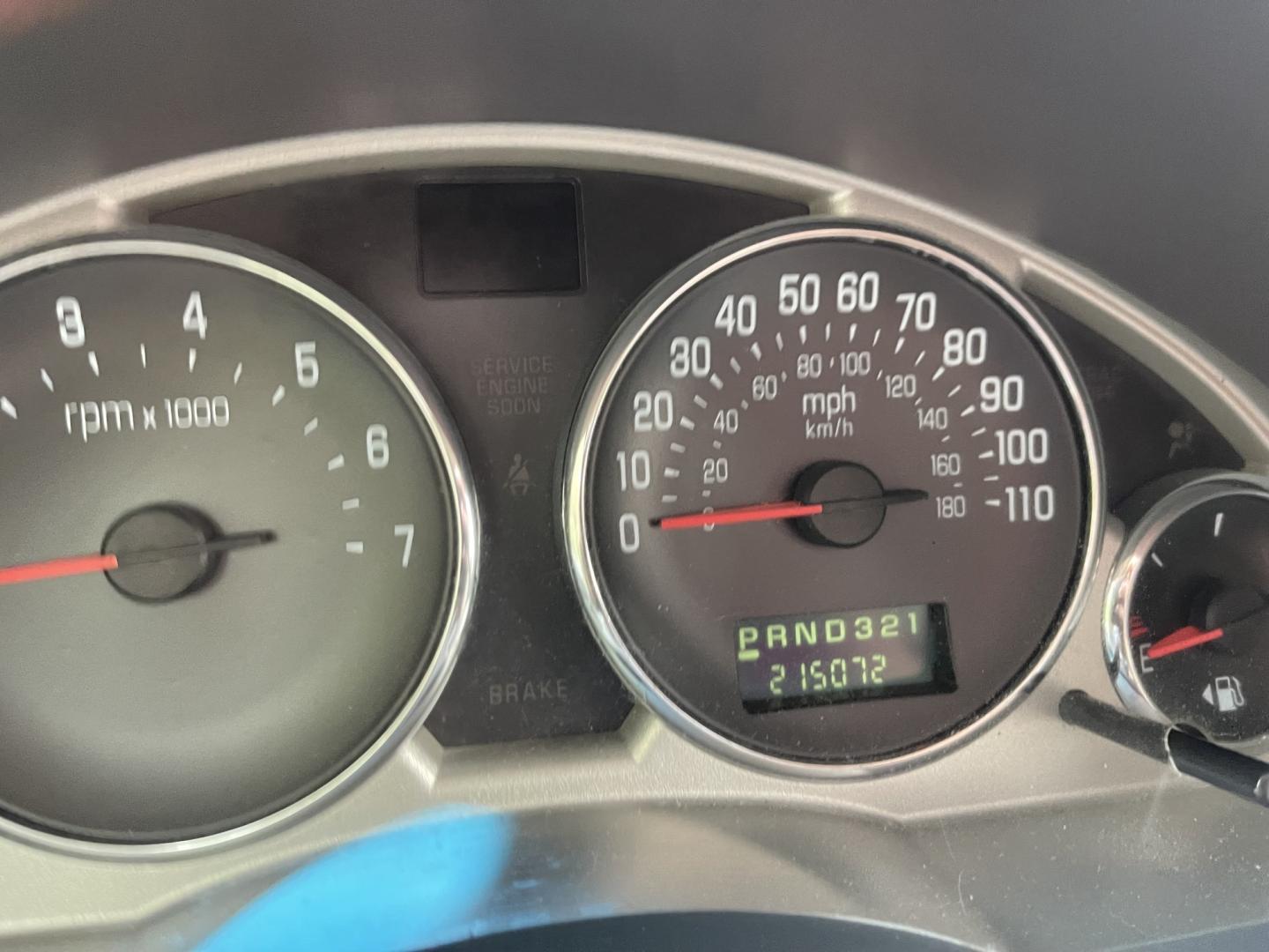 2005 White / Grey Buick Rendezvous CX (3G5DA03E65S) with an 3.4L V6 OHV 12V engine, 4A OD transmission, located at 813 E Fairview Ave, Meridian , ID, 83642, (208) 336-8230, 43.618851, -116.384010 - Runs and drives very well, A/C works perfect. If you need a cheap get around car this is a great choice.- Photo#6