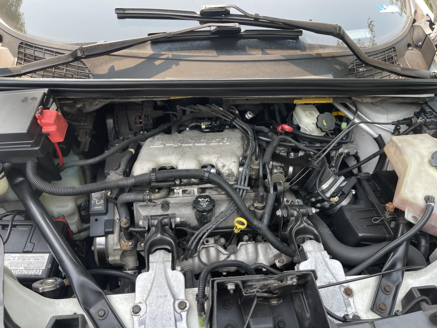 2005 White / Grey Buick Rendezvous CX (3G5DA03E65S) with an 3.4L V6 OHV 12V engine, 4A OD transmission, located at 813 E Fairview Ave, Meridian , ID, 83642, (208) 336-8230, 43.618851, -116.384010 - Runs and drives very well, A/C works perfect. If you need a cheap get around car this is a great choice.- Photo#11