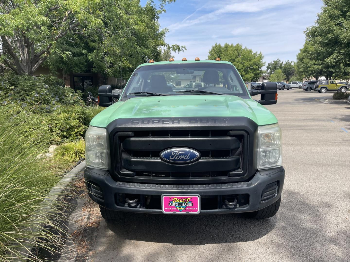 2011 Forest Service Green /Grey Ford F-350 SD XL 4WD (1FDRF3F68BE) with an 6.2L V8 OHV 16V engine, 6A transmission, located at 813 E Fairview Ave, Meridian , ID, 83642, (208) 336-8230, 43.618851, -116.384010 - 2011 Regular Cab Ford F350 with a 9' service box, 4x4, A/C. Super cool one ton truck. If you need a good work truck for cheap this is a fantastic option.- Photo#2
