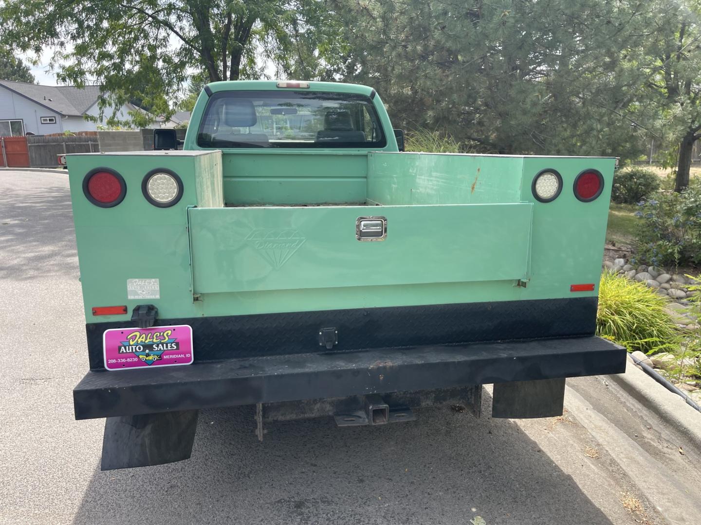 2011 Forest Service Green /Grey Ford F-350 SD XL 4WD (1FDRF3F68BE) with an 6.2L V8 OHV 16V engine, 6A transmission, located at 813 E Fairview Ave, Meridian , ID, 83642, (208) 336-8230, 43.618851, -116.384010 - 2011 Regular Cab Ford F350 with a 9' service box, 4x4, A/C. Super cool one ton truck. If you need a good work truck for cheap this is a fantastic option.- Photo#3