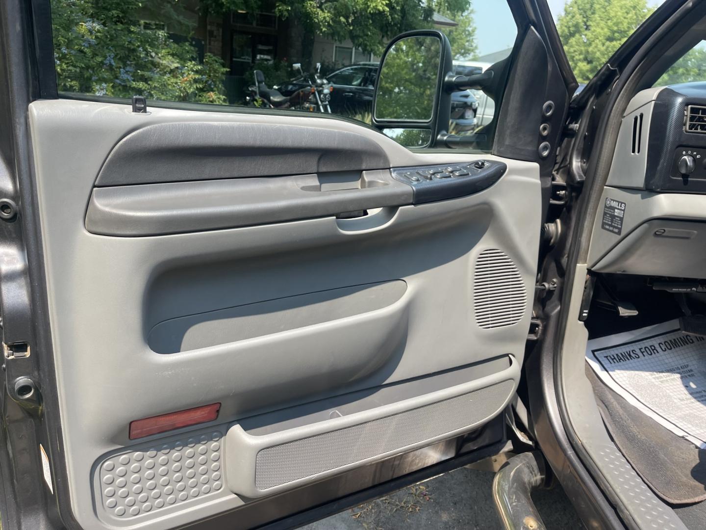 2004 Silver / Grey Ford F-350 SD Lariat Crew Cab 4WD DRW (1FTWW33P24E) with an 6.0L V8 OHV 32V TURBO DIESEL engine, AT transmission, located at 813 E Fairview Ave, Meridian , ID, 83642, (208) 336-8230, 43.618851, -116.384010 - 2004 Ford F350 Crew Cab 4x4 Lariat. Super cool pickup If you like these old Fords this is a super good one. Come check it out.- Photo#6