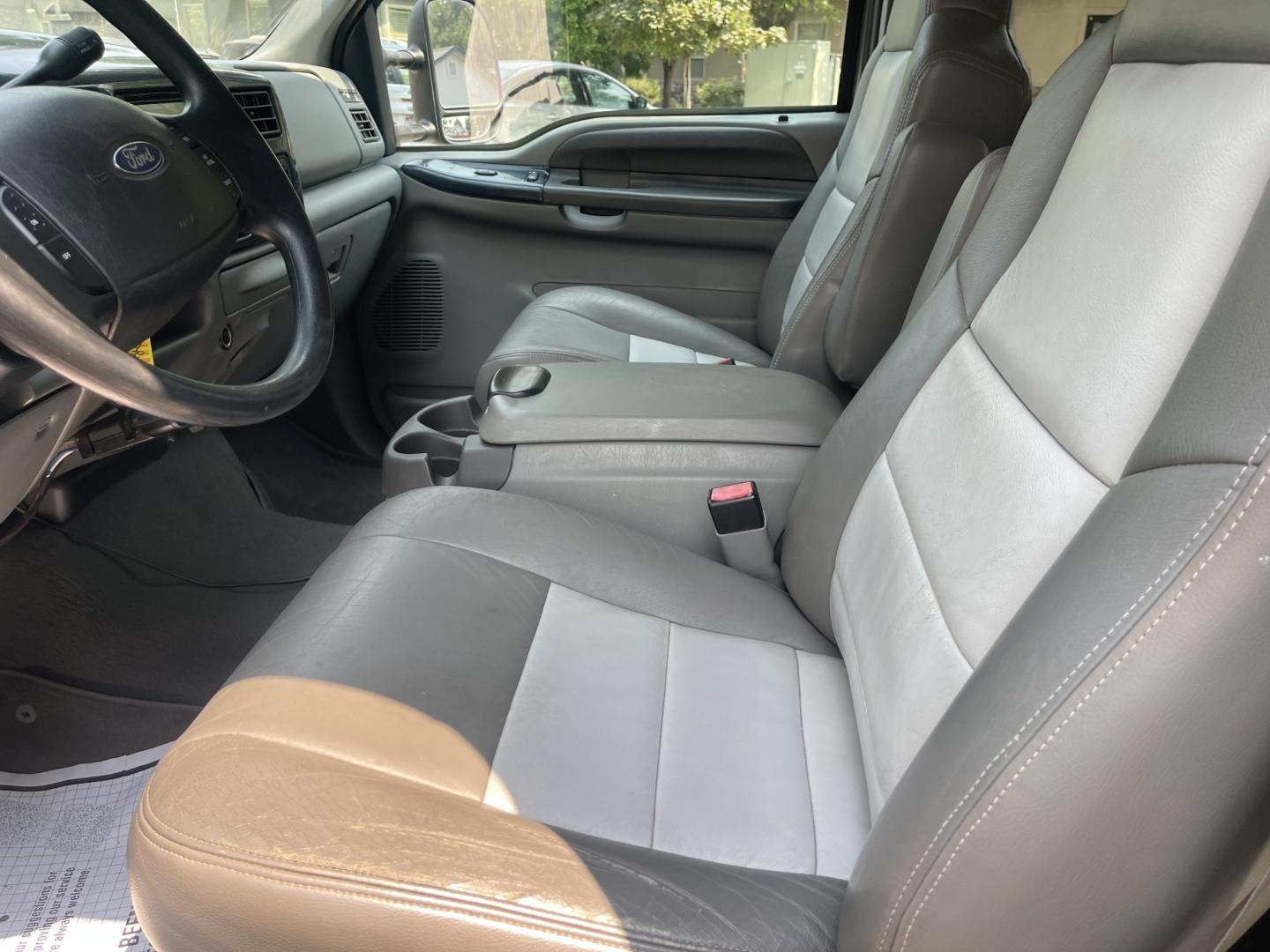 2004 Silver / Grey Ford F-350 SD Lariat Crew Cab 4WD DRW (1FTWW33P24E) with an 6.0L V8 OHV 32V TURBO DIESEL engine, AT transmission, located at 813 E Fairview Ave, Meridian , ID, 83642, (208) 336-8230, 43.618851, -116.384010 - 2004 Ford F350 Crew Cab 4x4 Lariat. Super cool pickup If you like these old Fords this is a super good one. Come check it out.- Photo#7