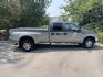 2004 Silver / Grey Ford F-350 SD Lariat Crew Cab 4WD DRW (1FTWW33P24E) with an 6.0L V8 OHV 32V TURBO DIESEL engine, AT transmission, located at 813 E Fairview Ave, Meridian , ID, 83642, (208) 336-8230, 43.618851, -116.384010 - 2004 Ford F350 Crew Cab 4x4 Lariat. Super cool pickup If you like these old Fords this is a super good one. Come check it out.- Photo#4