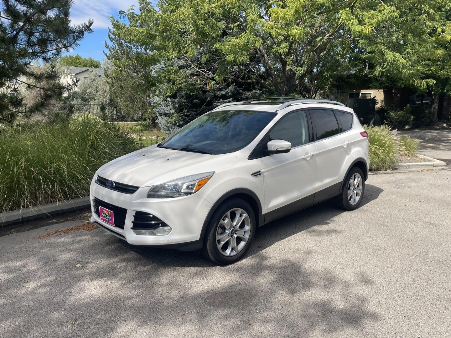 2014 White /Black Ford Escape Titanium 4WD (1FMCU9J95EU) with an 2.0L L4 DOHC 16V engine, 6-Speed Automatic transmission, located at 813 E Fairview Ave, Meridian , ID, 83642, (208) 336-8230, 43.618851, -116.384010 - 2014 Ford Escape Titanium AWD, one owner, very nice and clean, loaded with the big sunroof.- Photo#1