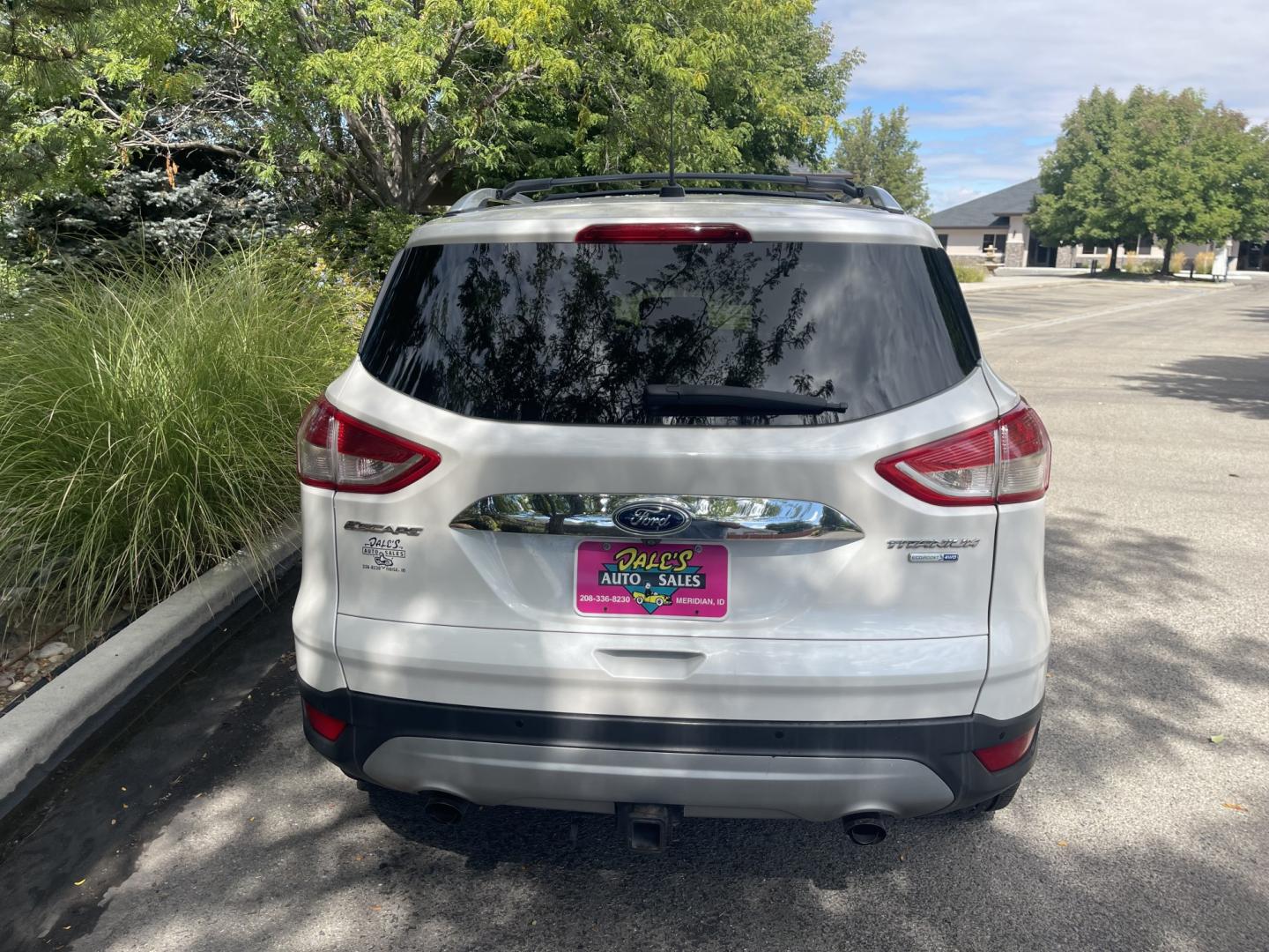 2014 White /Black Ford Escape Titanium 4WD (1FMCU9J95EU) with an 2.0L L4 DOHC 16V engine, 6-Speed Automatic transmission, located at 813 E Fairview Ave, Meridian , ID, 83642, (208) 336-8230, 43.618851, -116.384010 - 2014 Ford Escape Titanium AWD, one owner, very nice and clean, loaded with the big sunroof.- Photo#4