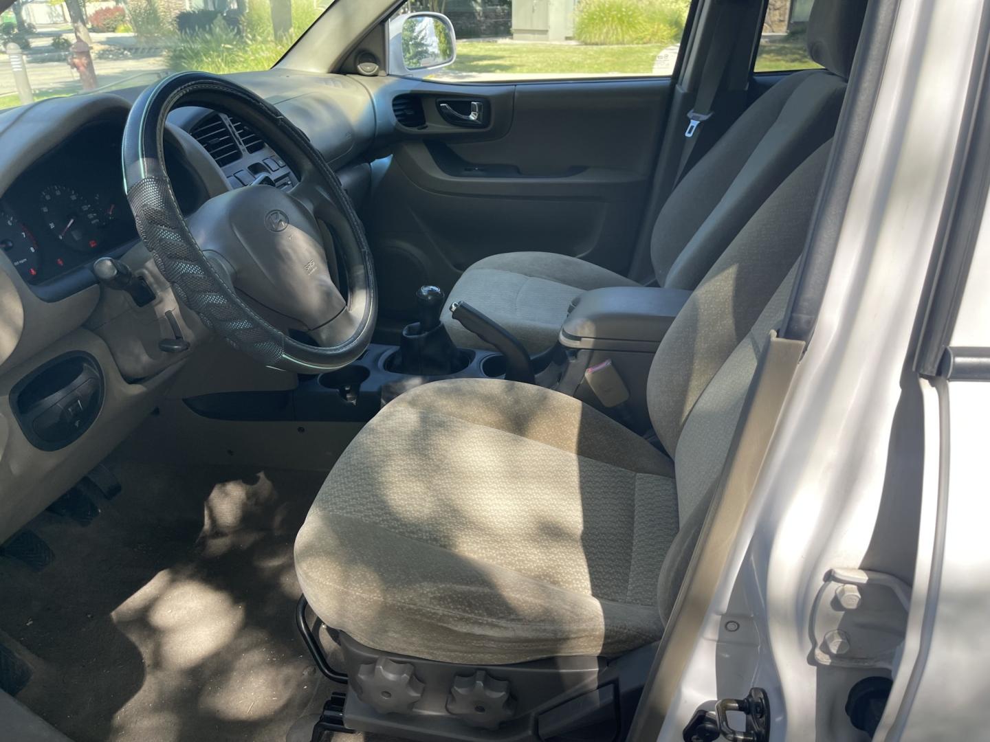 2004 White / Grey Hyundai Santa Fe Base (KM8SB12B74U) with an 2.4L L4 DOHC 16V engine, 5-Speed Manual Overdrive transmission, located at 813 E Fairview Ave, Meridian , ID, 83642, (208) 336-8230, 43.618851, -116.384010 - 2004 Hyundai Sante Fe with only 90k miles, runs and drives good, clean and ready to go. If you need a cheap SUV come and take a look.- Photo#6