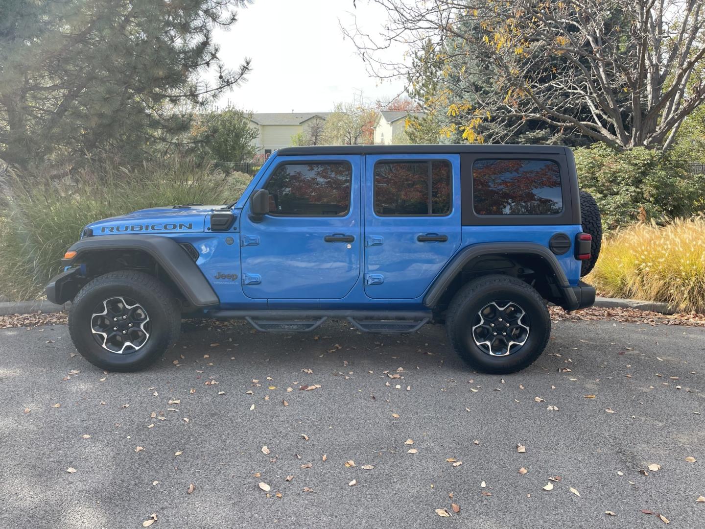 2023 Blue /Black Jeep Wrangler Unlimited Rubicon 4XE (1C4JJXR60PW) with an 2.0L L4 DOHC 16V HYBRID engine, 8A transmission, located at 813 E Fairview Ave, Meridian , ID, 83642, (208) 336-8230, 43.618851, -116.384010 - 2023 Jeep Wrangler Rubicon 4XE super cool plug in hybrid, with factory lifetime warranty on the Battery. So have fun with the Wrangler and get great MPG as well.- Photo#0