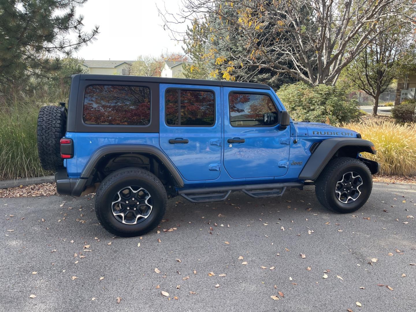 2023 Blue /Black Jeep Wrangler Unlimited Rubicon 4XE (1C4JJXR60PW) with an 2.0L L4 DOHC 16V HYBRID engine, 8A transmission, located at 813 E Fairview Ave, Meridian , ID, 83642, (208) 336-8230, 43.618851, -116.384010 - 2023 Jeep Wrangler Rubicon 4XE super cool plug in hybrid, with factory lifetime warranty on the Battery. So have fun with the Wrangler and get great MPG as well.- Photo#2